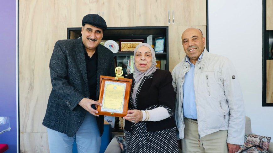 العنزى يكرم فتح الله